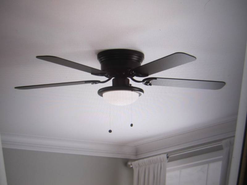 lot 164 image: Hugger 52 LED Indoor Black Ceiling...