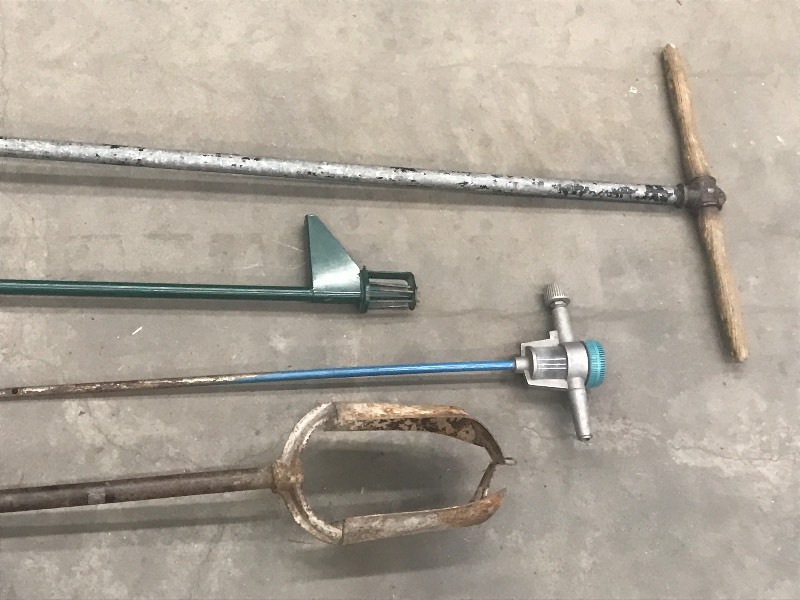 lot 15 image: Post Hole Diggers & Yard Tools