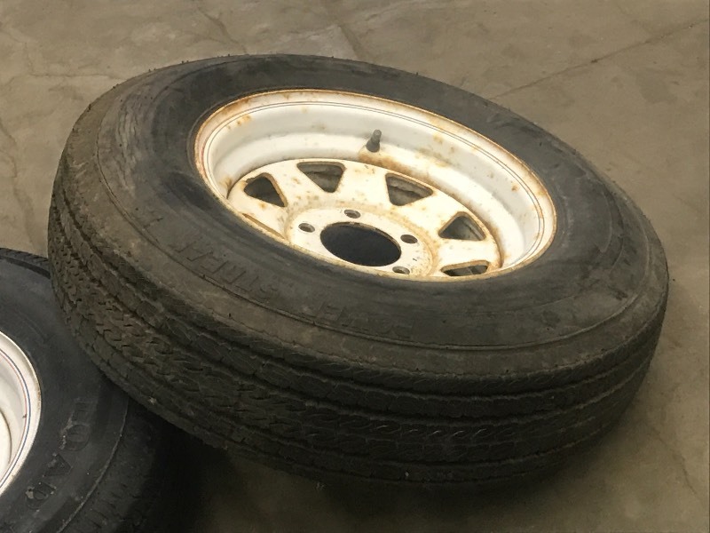 lot 21 image: (2) Trailer Wheels & Tires