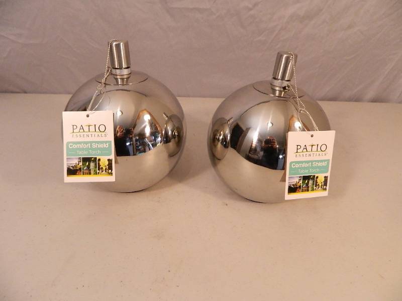lot 22 image: 2 New Comfort Shield Refillable Table Torches