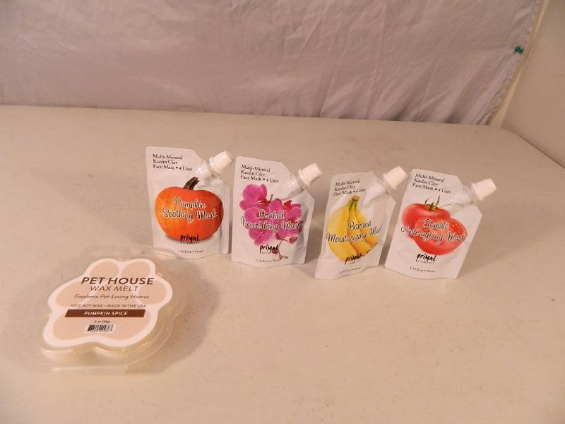 lot 87 image: 4 New Primal Elements Face Masks and New Pet House Wax Melts