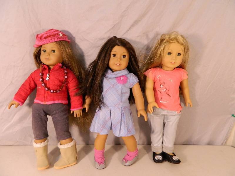 lot 97 image: 3 American Girl Dolls