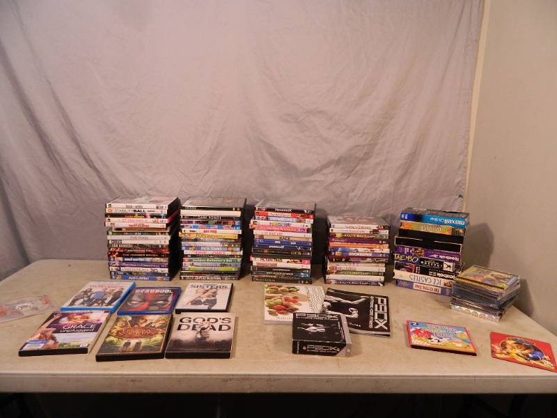 lot 146 image: DVDs, P90X, and Media