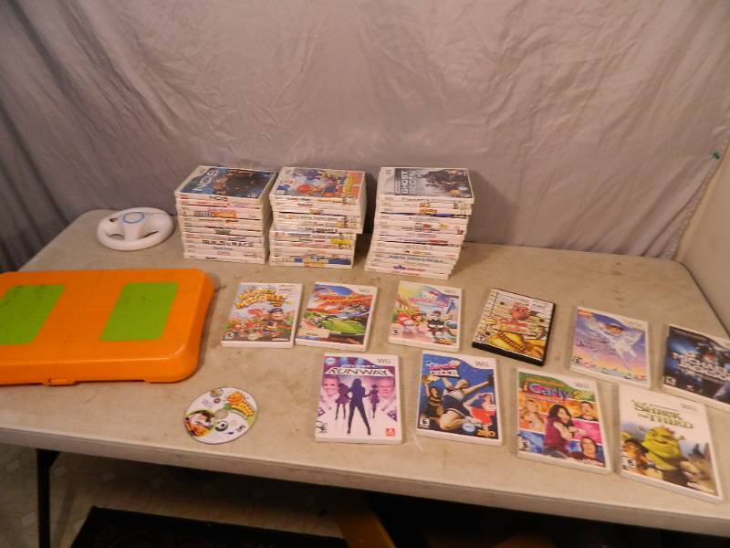 lot 166 image: Nintendo Wii Games and Acessories