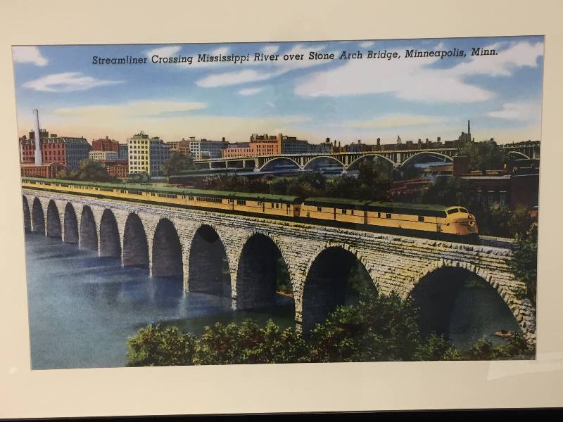 lot 28 image: Streamliner Crossing Mississippi Framed Picture