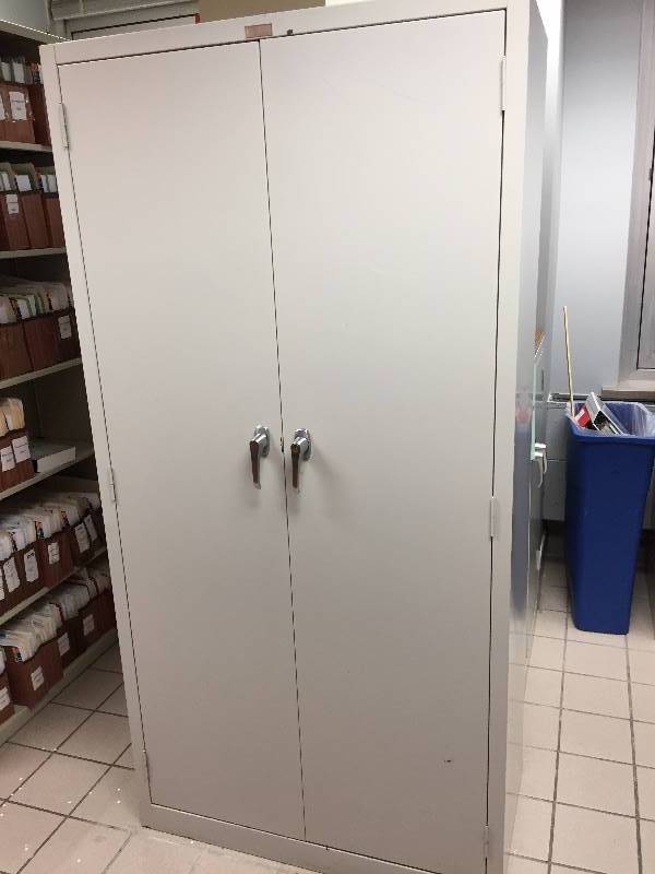 lot 65 image: Metal Cabinet with Doors  Contents by Office Impressions