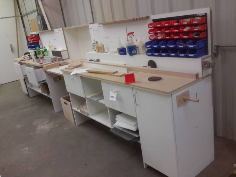 lot 250 image: Work Bench as pictured..Includes anything in the drawers.  Dim 49in x 24in x 84in.. 2 Upright book cases 40 in x 12in x 72in h