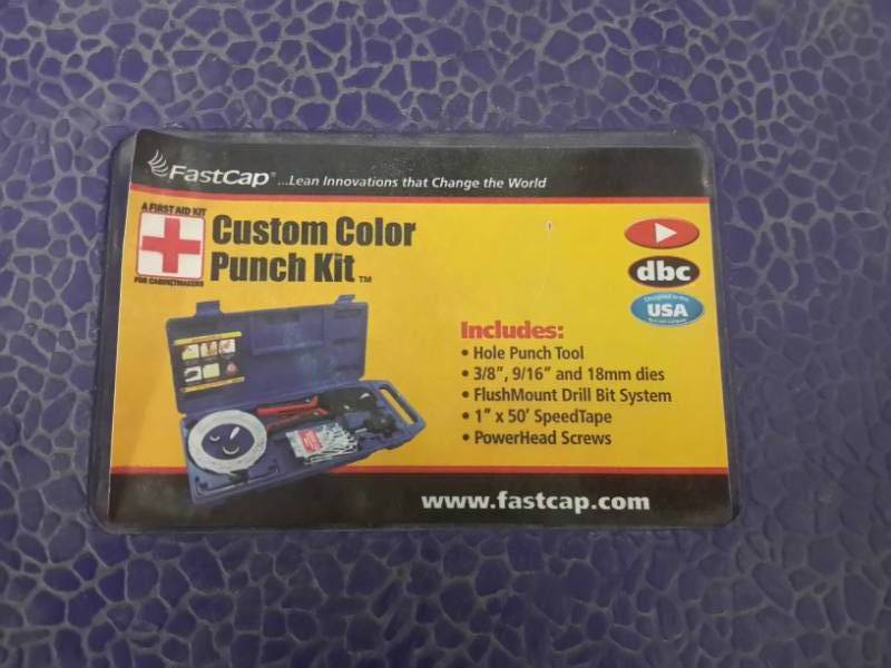 lot 286 image: Custom Color Punch Kit.