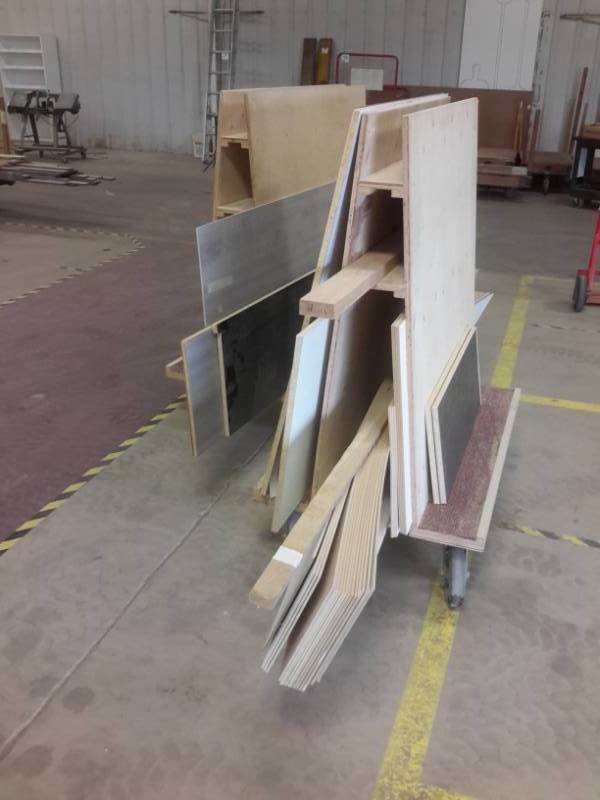 lot 318 image: 2 Upright material carts with all the laminate and hardboard material on the carts.. Misc. Sizes types.  Please inspect