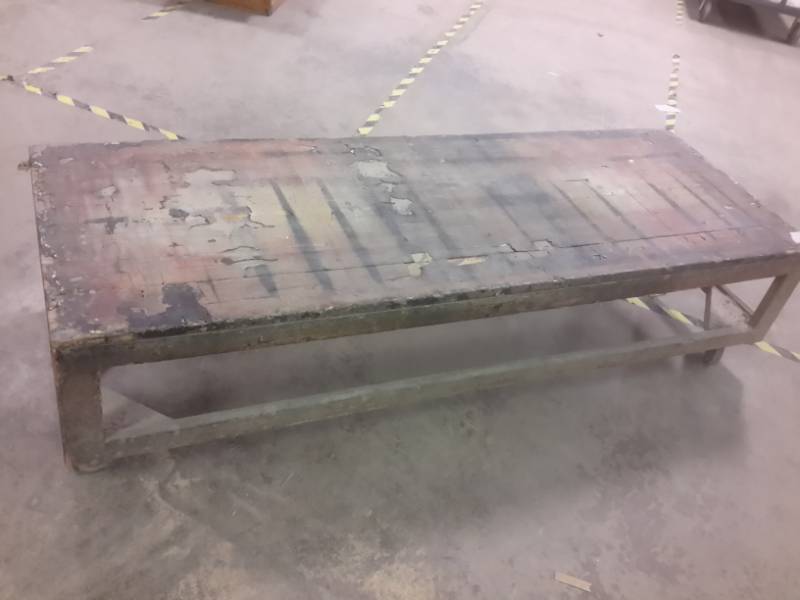 lot 345 image: Low stature work table on wheels.  Approx 24in x 18in x 72in