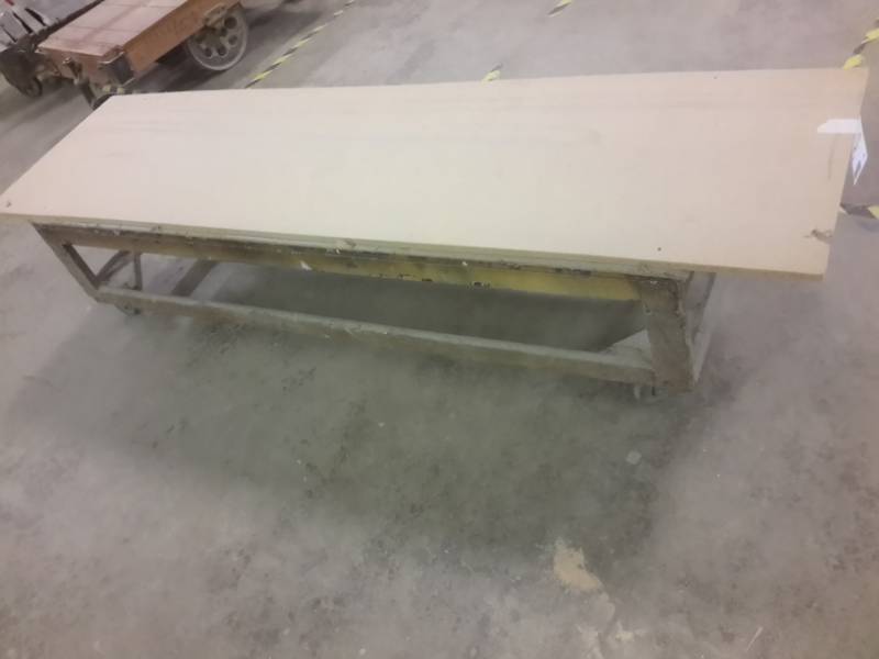 lot 344 image: Low stature work table on wheels.  Approx 24in x 28in x 85in