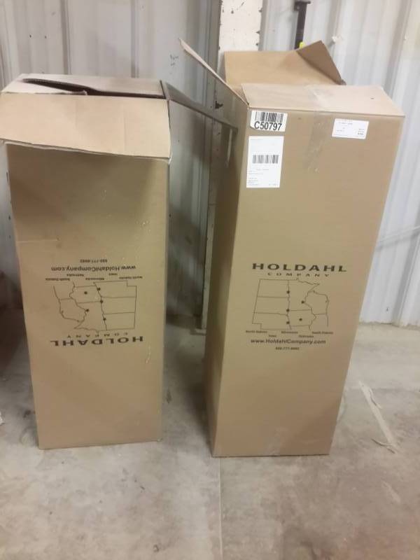 lot 349 image: 2 boxes of veneer.   48in x 96 in Red oak veneer
