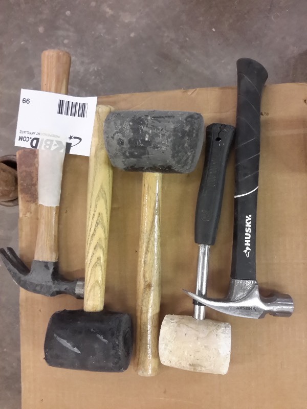lot 99 image: 3 rubber mallets and 2 claw hammers