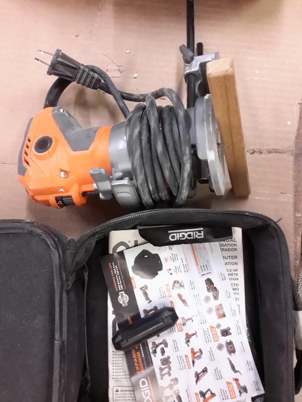lot 107 image: Ridgid R2401 Laminate Trim Router