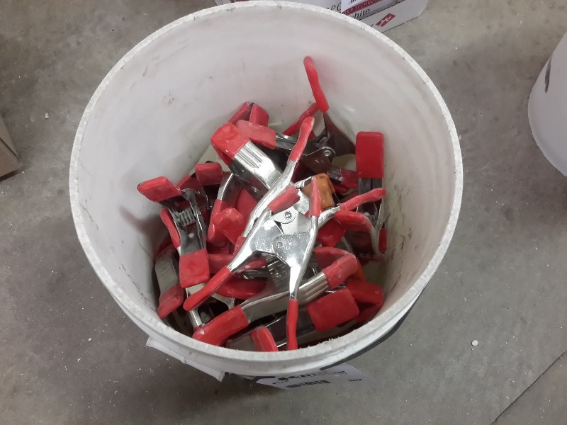 lot 302 image: Pail of Clamps