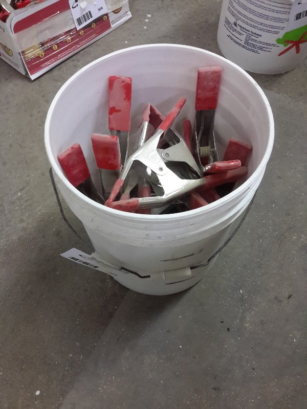 lot 303 image: Pail of Clamps