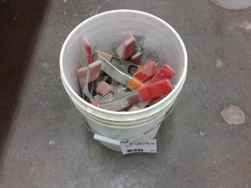 lot 307 image: Pail of clamps