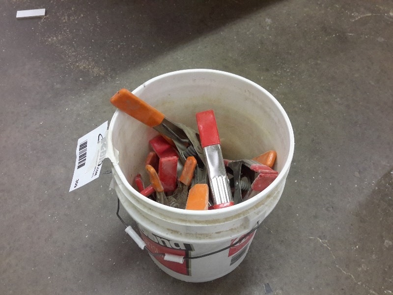 lot 309 image: Pail of Clamps