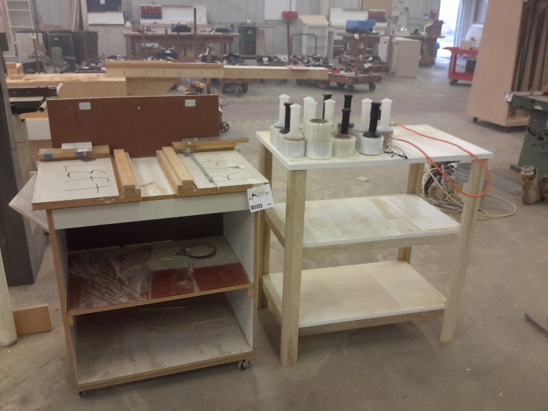 lot 380 image: 2, work benches.. Both approx 18 in x 36in  One is 28in h One 32in h. Misc. plastic wrap and a hose of some type.. Not sure of  the nozzel type.