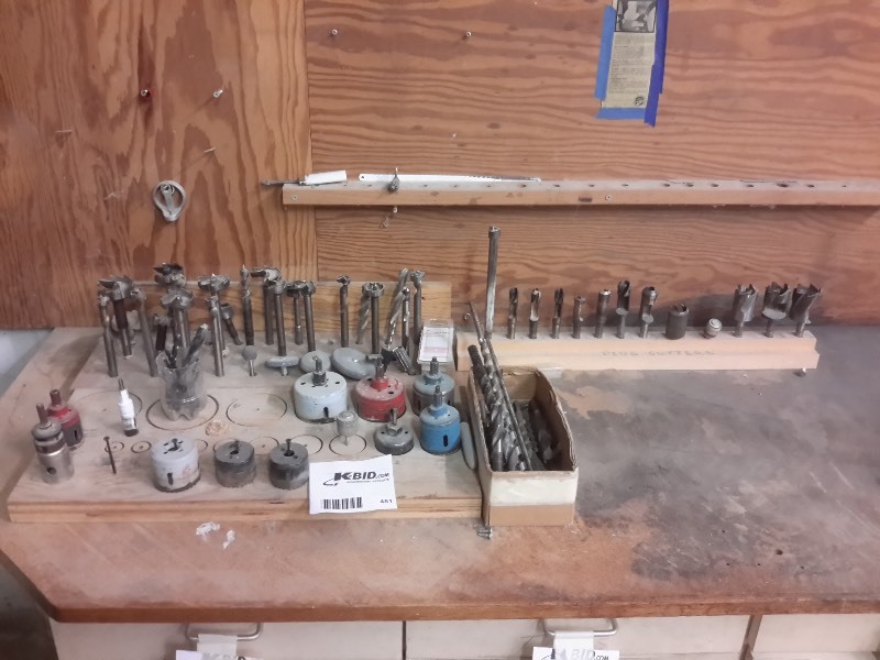 lot 451 image: Lot of BITS from the tool bench.  Includes Hole Saws, Router bits, Drill bits as pictured