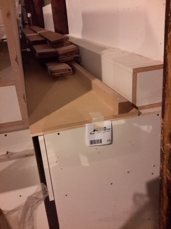 lot 535 image: Laminate covered work bench..
