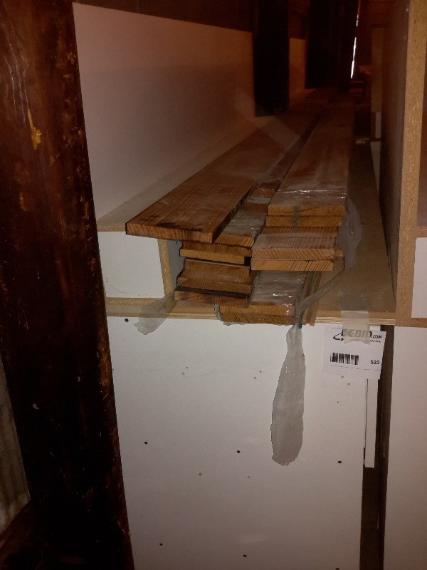 lot 533 image: Laminate covered work bench..