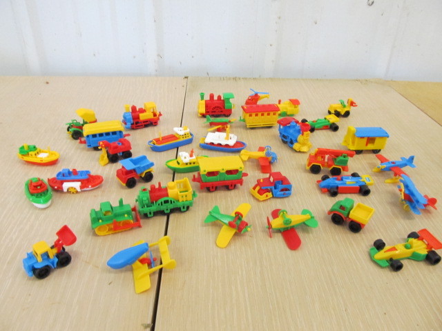 lot 21 image: Large Lot of Vintage West German BRUDER Toy Vehicles