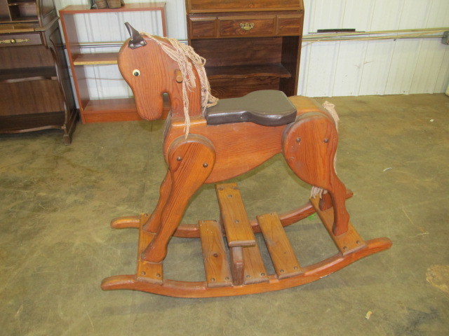 lot 28 image: Large Solid Wood Rocking Horse