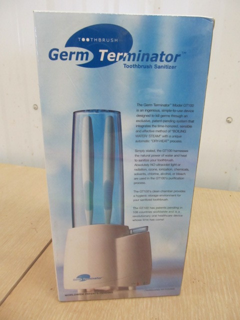 lot 200 image: NEW Germ Terminator Toothbrush Cleaner
