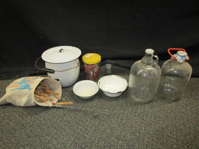 Enamel pot with cover, enemale bowls, old clothes pins, jar full old fire crackers and old jars