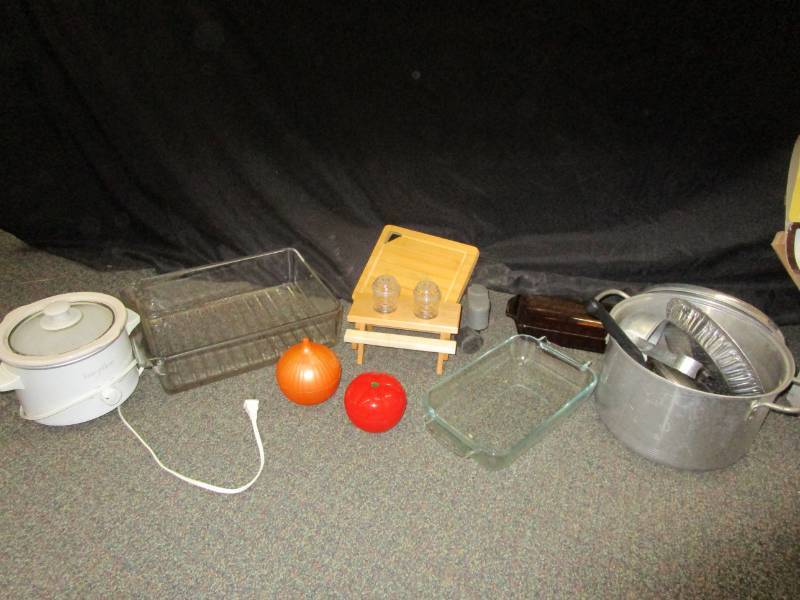 Small crockpot, soup kettle, pan, salt Glass refrigerator drawer, pans and pepper and various items.