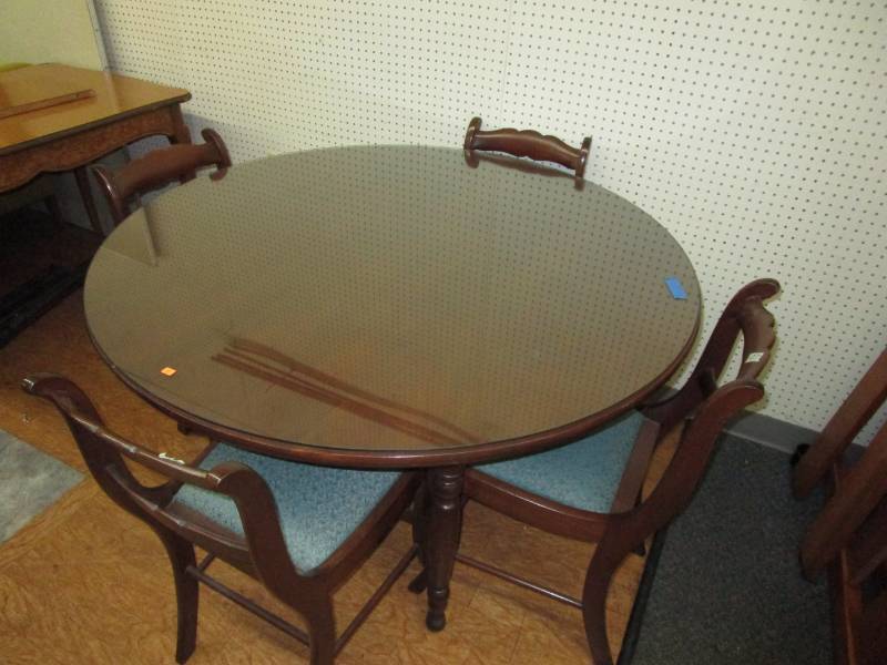 4ft round wood table with glass top and 4 chairs