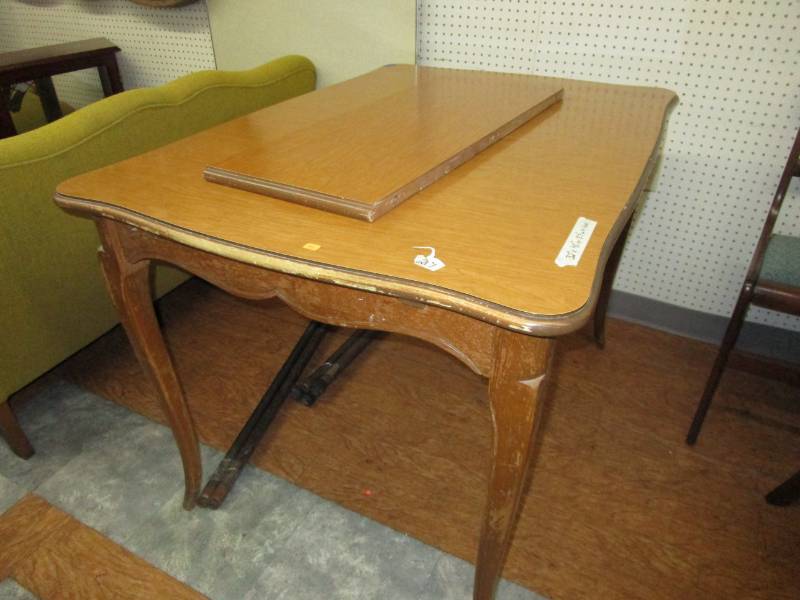 32 x 45 or 57 with leaf wood table with formica top