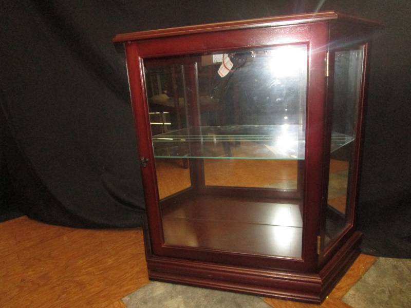 33 width 11 deep by 29 tall Lighted cabinet with mirrored back and glass shelf