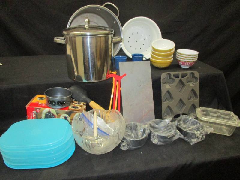 Stainless steel pots, 4 springform pans, Castbar pan, tuperware, porcelain strainer, enamle cups, serving bowl, utinsils