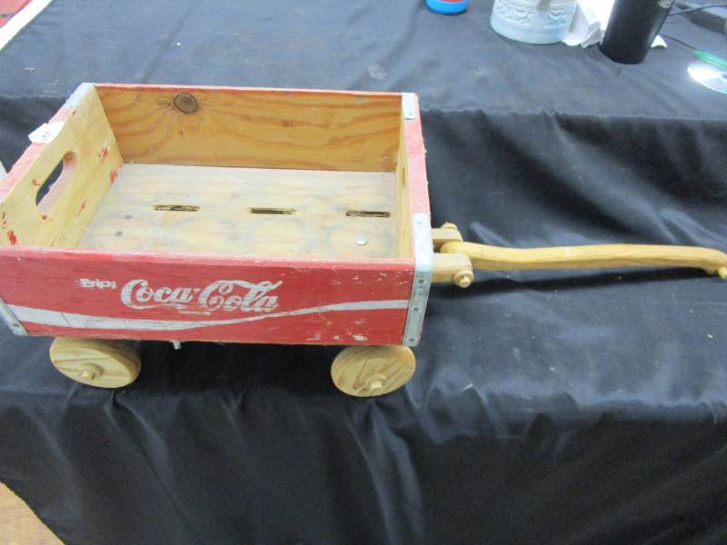 Coca Cola Pop Crate made into  a wagon with Wooden Wheels