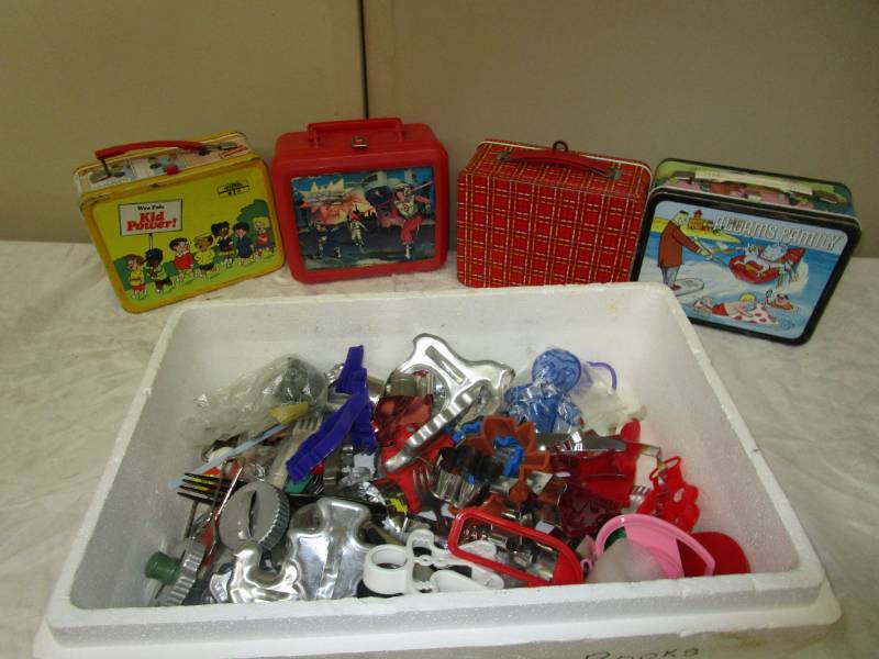 Variety of Old lunch boxes, assortment of cookie cutters and other silverware