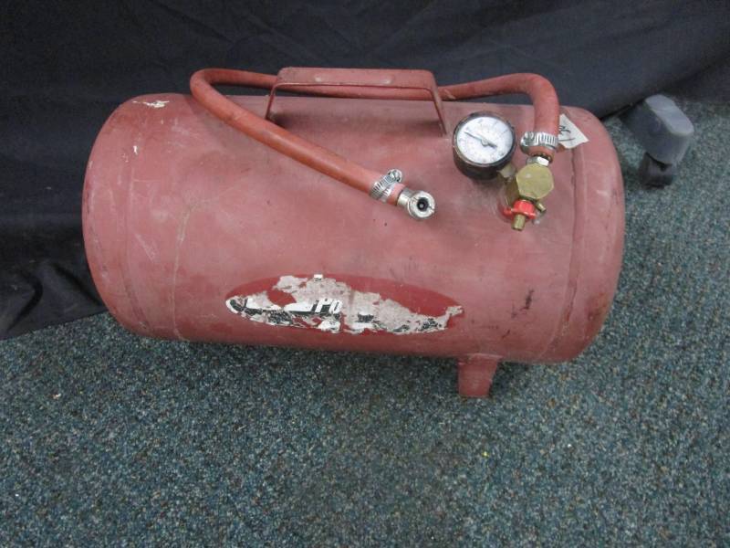 Small red air tank