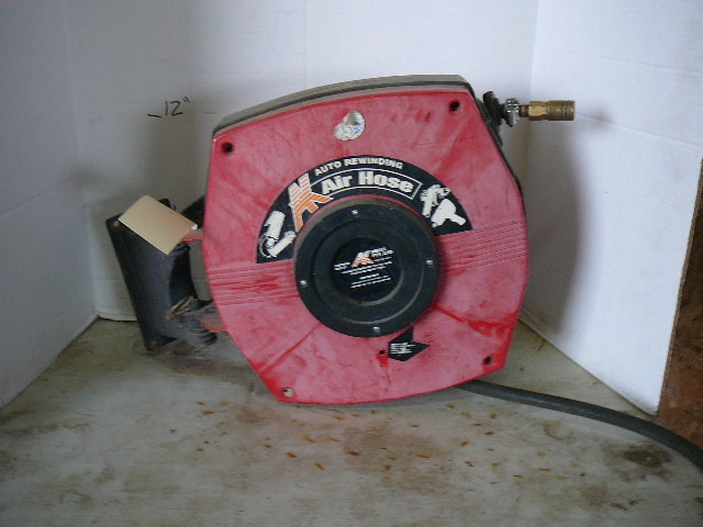 lot 3 image: 25 AK Auto Rewinding wheel