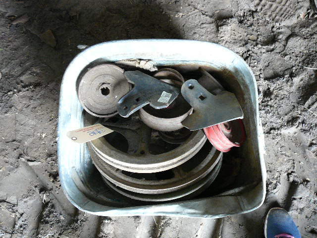 lot 245 image: Misc. pulleys Approx. a dozen 4 - 12 diameter with 2 Chisel Teeth