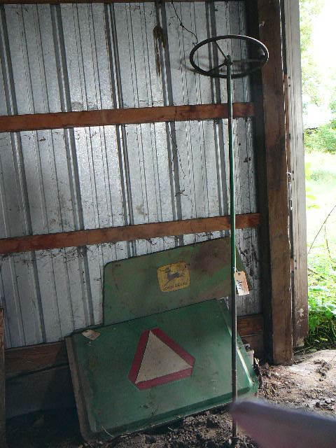 lot 248 image: John Deere belt guard for combine, John Deer Steering Colum, John Deere Rear Panel for Combine
