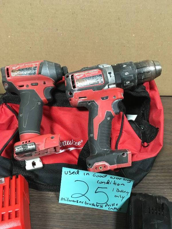 lot 25 image: M18 18-Volt Lithium-Ion Brushless Cordless Hammer DrillImpact Combo Kit (2-Tool) W(1) Battery, Charger, Bag  Used in good working cond.