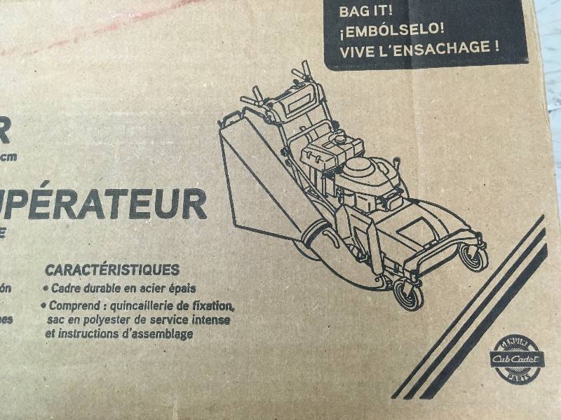 lot 73 image: Cub Cadet Bagger for 33 in Wide Area Walk-Behind Mowers 19A20001100 not used