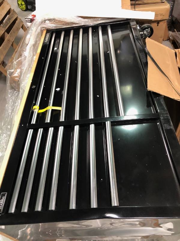 lot 101 image: Husky 62 in. 14-Drawer Mobile Workbench with Solid Wood Top, Black not used