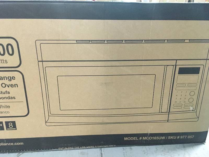lot 15 image: Magic Chef 1.6 cu. ft. Over the Range Microwave in White   Used in good working cond.