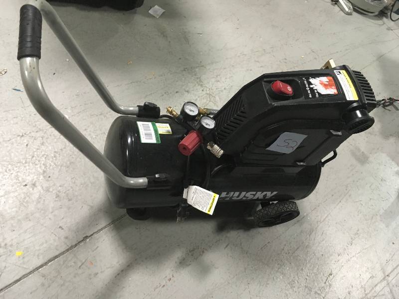 lot 52 image: Husky 8 Gal. Portable Oil Free Electric Air Compressor  Used in good working cond.