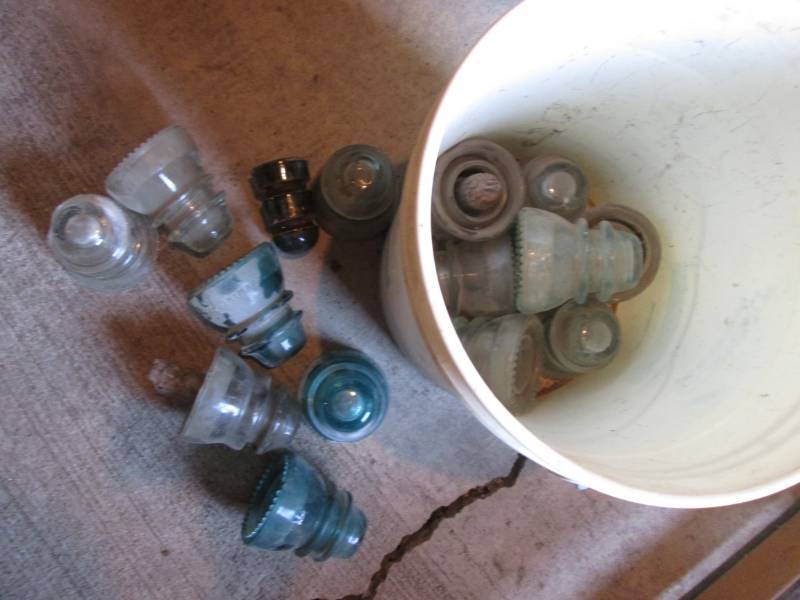 lot 12 image: Antique electical insulators...