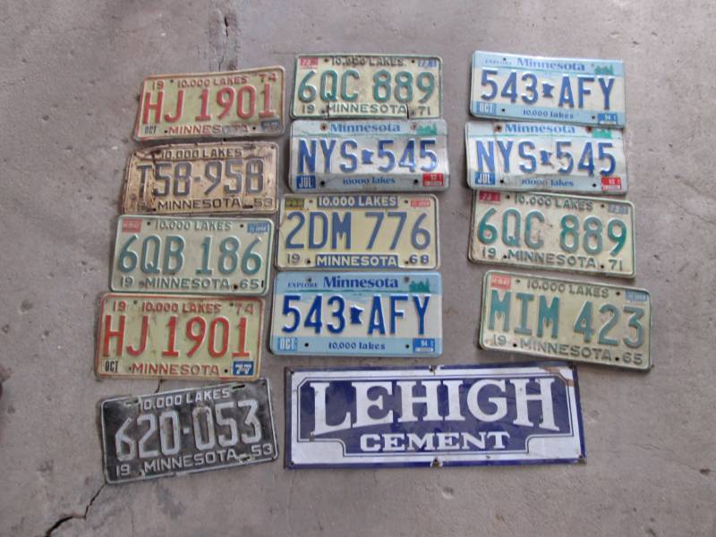 lot 42 image: Vintage license platesLehigh Cement...
