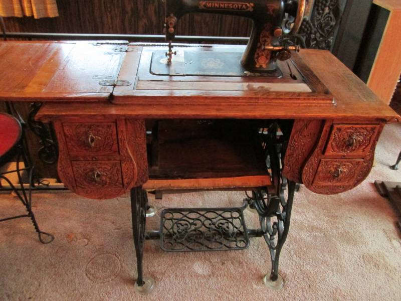 minnesota treadle sewing machine in cabinet