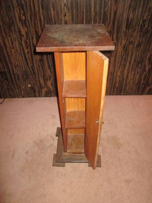 lot 123 image: Oak plant stand with swing door...